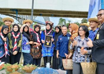 Pramuka Barito Utara Semarakkan Festival Manumpi Jawaw
