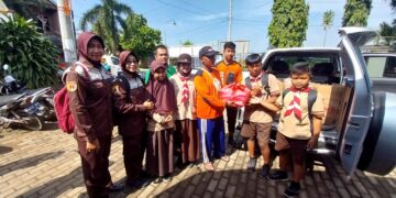 Pramuka Pangkalan Gugusdepan SDN 2 Kuanyar Peduli Korban Banjir Dorang Jepara