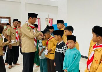 Kwarcab Pelalawan Bagikan Ratusan Takjil dan Santuni Anak Yatim