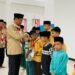Kwarcab Pelalawan Bagikan Ratusan Takjil dan Santuni Anak Yatim