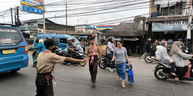 Gerakan Pramuka Kwartir Ranting Caringin turut serta dalam kegiatan Pengamanan Lalu Lintas menjelang Hari Raya Idul Fitri 1446 H pada hari Kamis