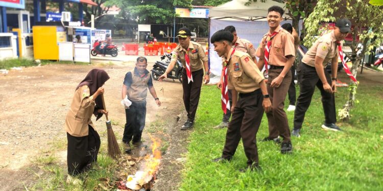 Pramuka Peduli Kwarcab Banda Aceh Laksanakan Karya Bakti Lebaran 2025 di Pelabuhan Ulee Lheue