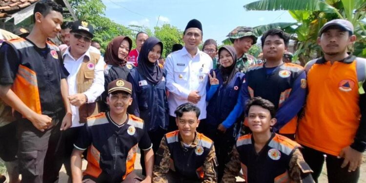 Pramuka Siapkan 1000 Nasi Bungkus Di Dapur Umum Posko Banjir