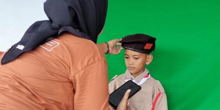 Langkah Awal Menuju Kesempurnaan: Pramuka SD Inpres 4/82 Bulu Ulaweng Lakukan Perekaman KTA Pramuka Nasional