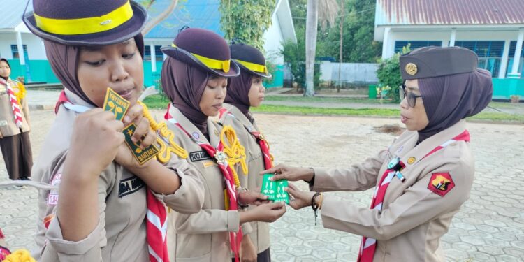 Prosesi Khidmat Pelantikan 4 Putra dan 4 Putri Penegak Bantara Ambalan Tomau UPT SMAN 19 Bone