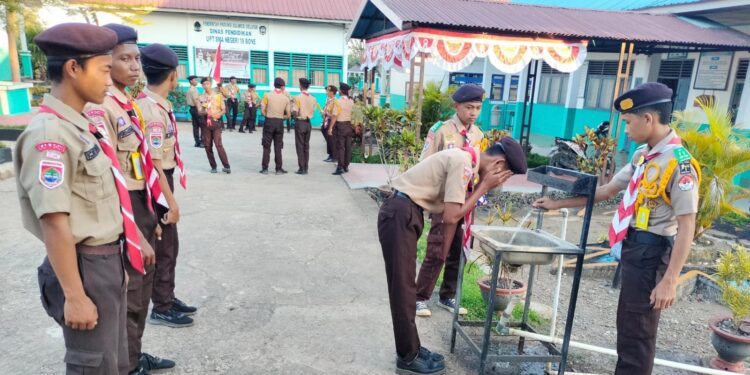 Prosesi Khidmat Pelantikan 4 Putra dan 4 Putri Penegak Bantara Ambalan Tomau UPT SMAN 19 Bone