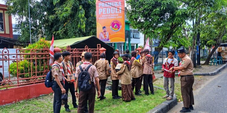 Pramuka MAN 2 Banda Aceh Bersama Pramuka Peduli Kwarda Aceh Galang Dana untuk Korban Banjir Aceh