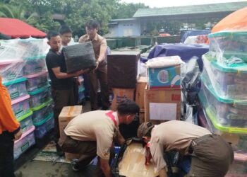 Pramuka Jakarta Gelar Aksi Kemanusiaan di Posko Logistik Bantuan Bencana Alam Sumatera