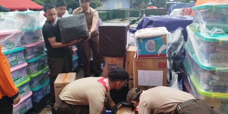 Pramuka Jakarta Gelar Aksi Kemanusiaan di Posko Logistik Bantuan Bencana Alam Sumatera
