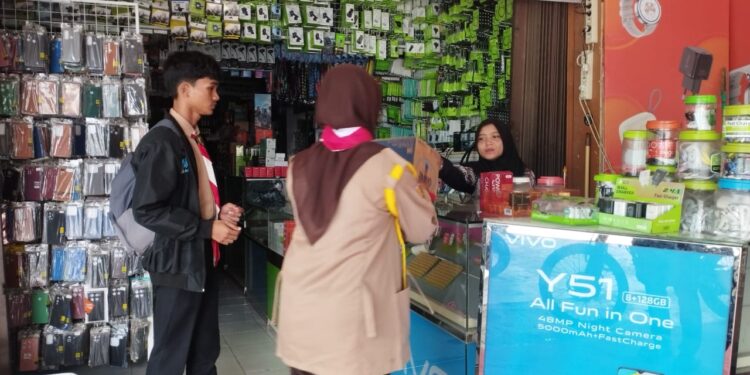 Pramuka MAN 2 Banda Aceh Bersama Pramuka Peduli Kwarda Aceh Galang Dana untuk Korban Banjir Aceh