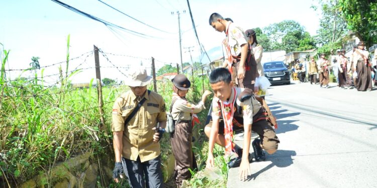 Pramuka Garuda Kwarran Ciawi Gelar Bakti Lingkungan di CFD Kecamatan Ciawi