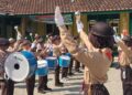 Drumband Penggalang SDN 2 Dukuhwaluh Kembaran Sambut Tim Penilai Lomba Kwarran Tergiat 2026
