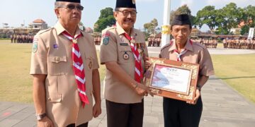 Momen Haru Apel Hari Pramuka ke-65, Kwarda Bali Beri Penghormatan Khusus bagi Almarhum Kak Saheran Penggagas Lambang Kwarda